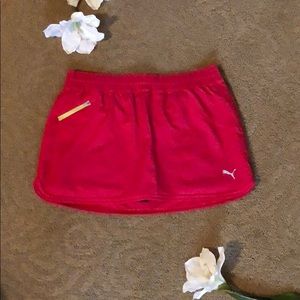 Magenta running skort by Puma